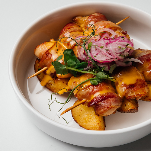 Куриные бедра в беконе